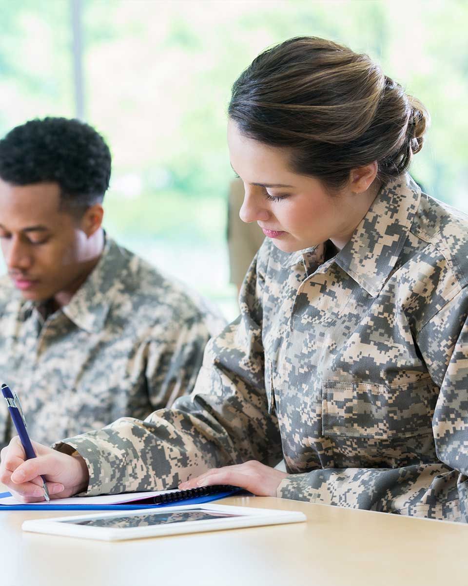 Soldier working on tablet