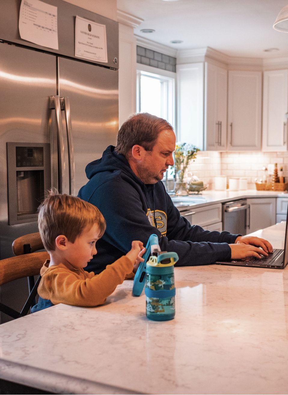 Dad and son at kitchen table